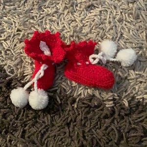 Knitted baby booties with tassels good cond